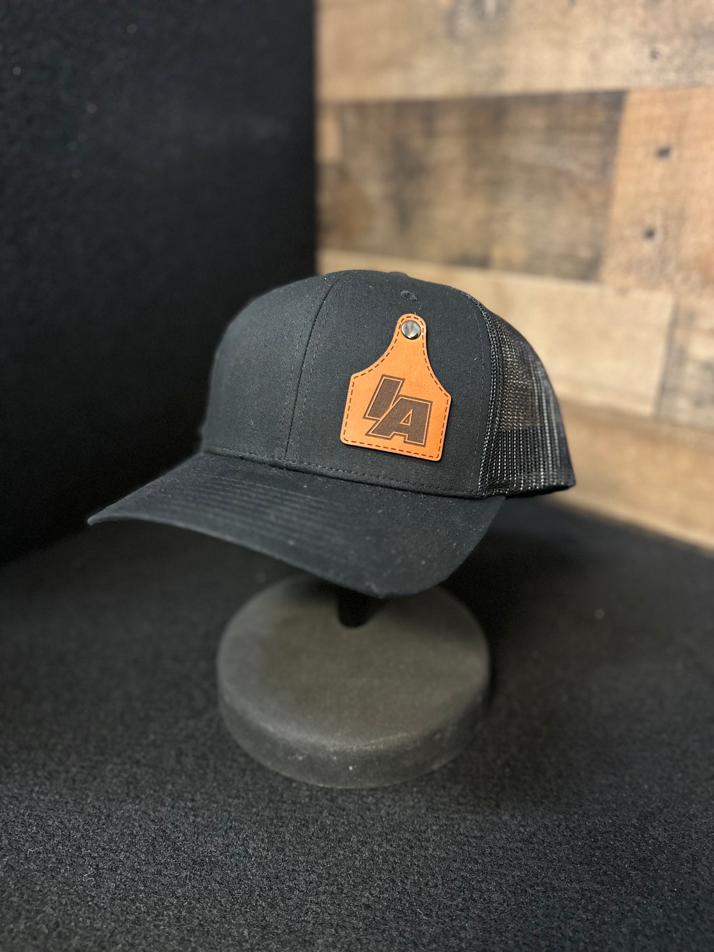 IAwrestle Leather Cattle Tag Trucker Hat