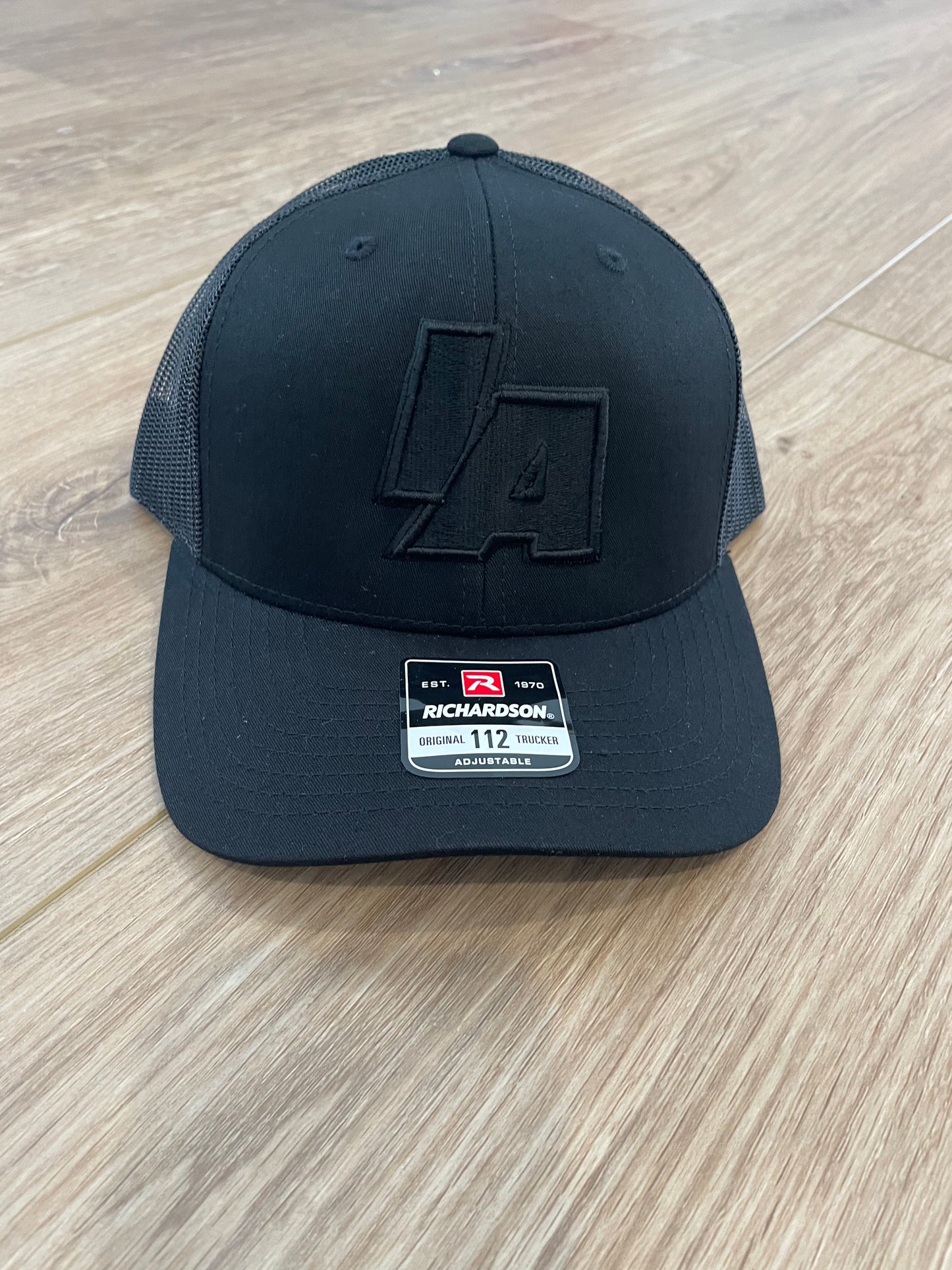 Blacked Out IAWrestle Richardson Trucker hat